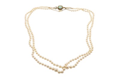 Lot 16 - A double-strand cultured pearl necklace with an opal and diamond clasp
