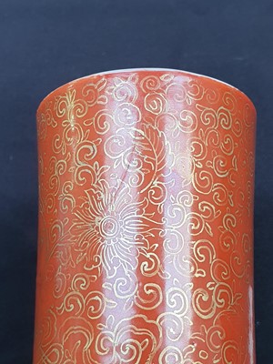 Lot 13 - A CHINESE FAMILLE ROSE CORAL-GROUND BOTTLE VASE.