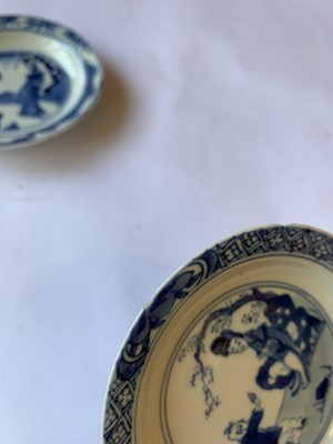 Lot 432 - FOUR CHINESE BLUE AND WHITE 'LADY AND BOY' SAUCERS.