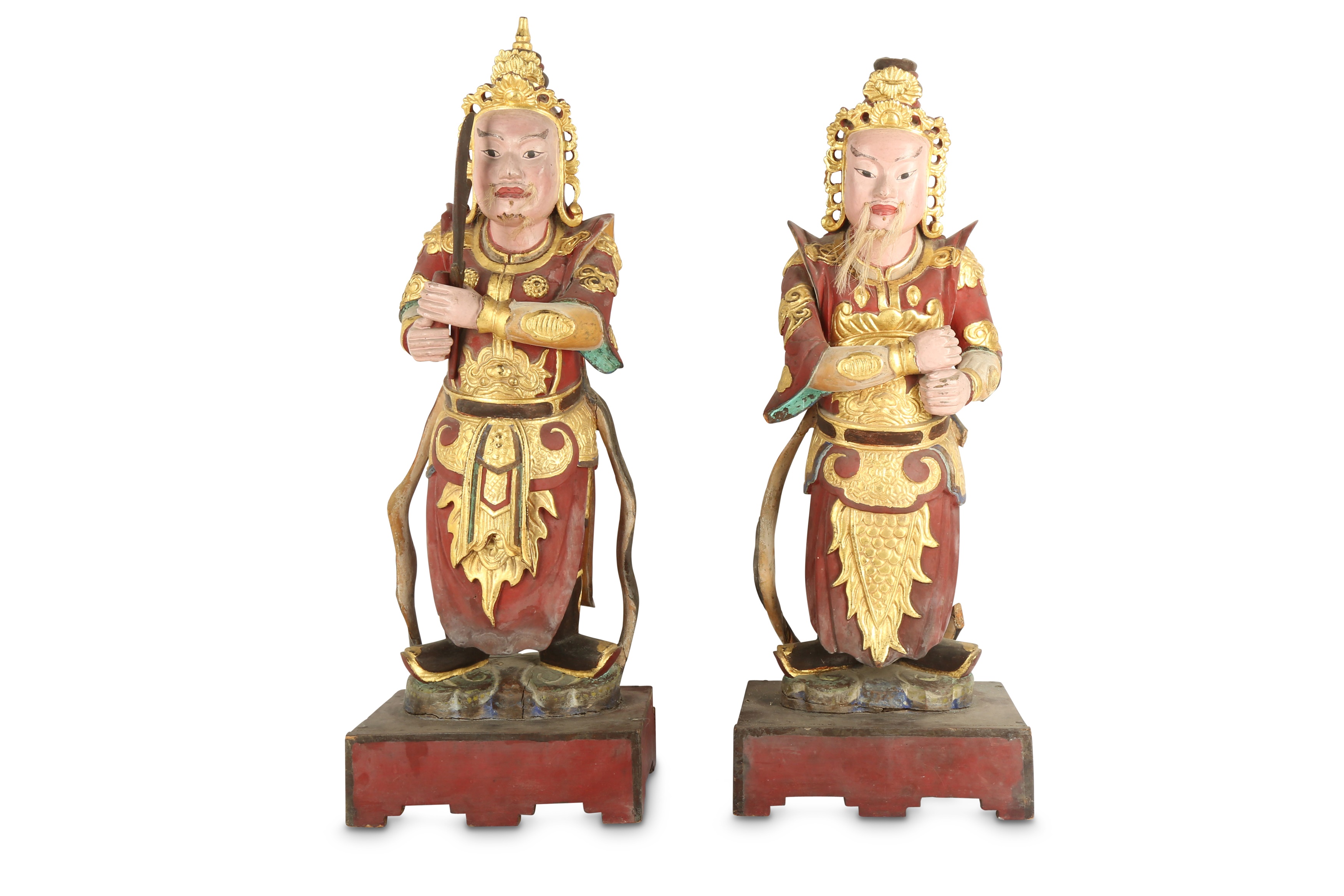 Lot 704 A PAIR OF VIETNAMESE FIGURES OF WARRIORS.