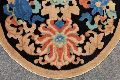 Lot 18 - AN UNUSUAL CHINESE LARGE RUG