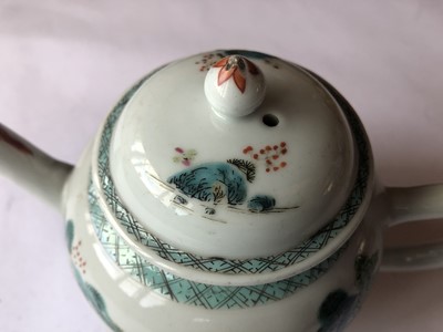 Lot 458 - A CHINESE FAMILLE ROSE 'MAN AND HIS DOG' TEAPOT AND COVER.