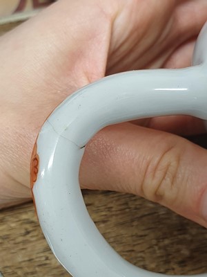 Lot 458 - A CHINESE FAMILLE ROSE 'MAN AND HIS DOG' TEAPOT AND COVER.