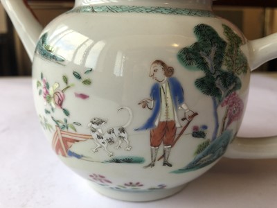 Lot 458 - A CHINESE FAMILLE ROSE 'MAN AND HIS DOG' TEAPOT AND COVER.
