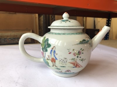 Lot 458 - A CHINESE FAMILLE ROSE 'MAN AND HIS DOG' TEAPOT AND COVER.