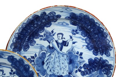 Lot 317 - Ten mid 18th century Delft plates and two chargers in Camaïeu bleu