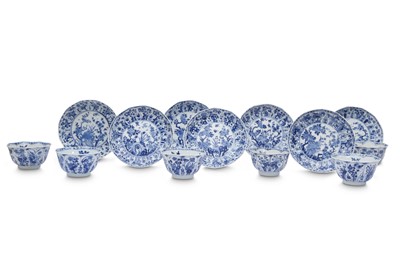 Lot 408 - SIX CHINESE BLUE AND WHITE 'LOTUS PETALS' CUPS AND SEVEN SAUCERS.