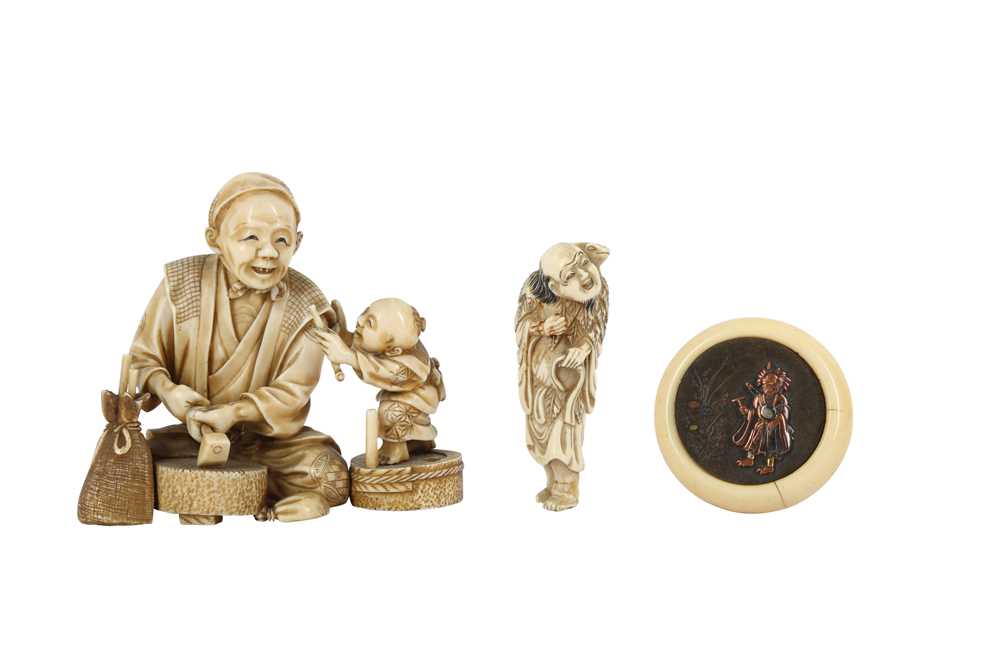 Lot 1023 - λ THREE JAPANESE IVORY CARVINGS.