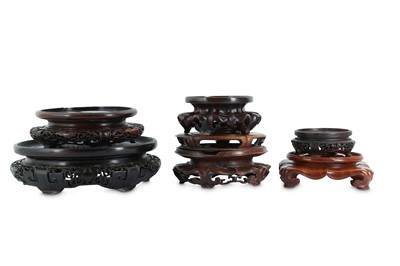 Lot 717 - SEVEN CHINESE CIRCULAR WOOD STANDS.