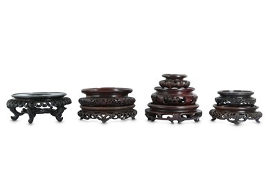 Lot 720 - EIGHT CHINESE CIRCULAR WOOD STANDS.