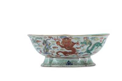 Lot 749 - A CHINESE FAMILLE ROSE LOBED 'NINE DRAGONS' STEM BOWL.