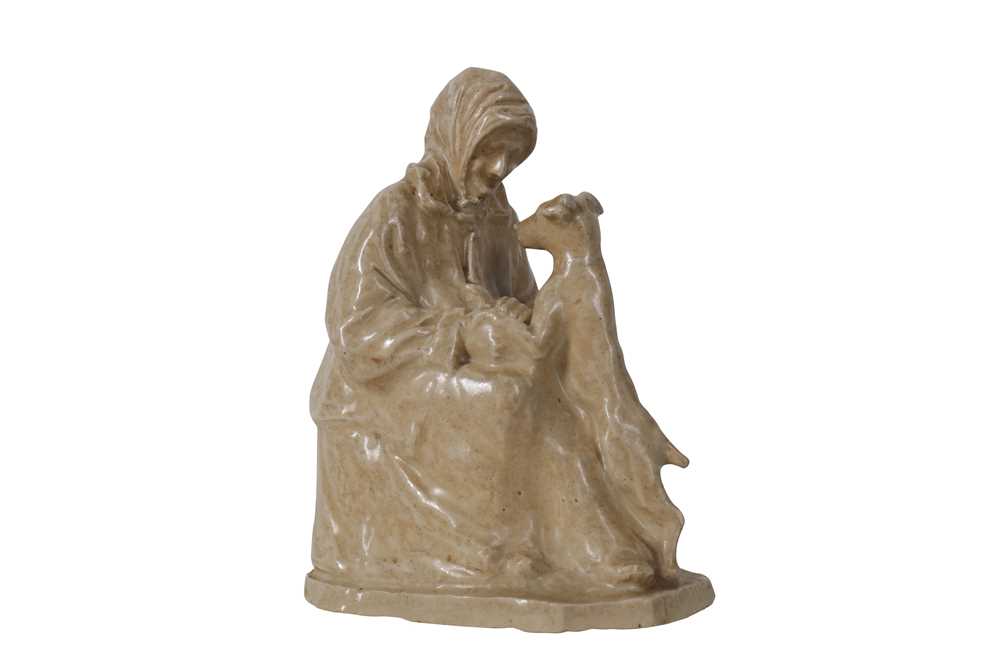 Lot 65 - AN EARLY 20TH CENTURY GLAZED EARTHENWARE FIGURE OF AN ELDERLY LADY WITH HER DOG ATTRIBUTED TO MARY BUCHANAN (SCOTTISH 1876-1958)