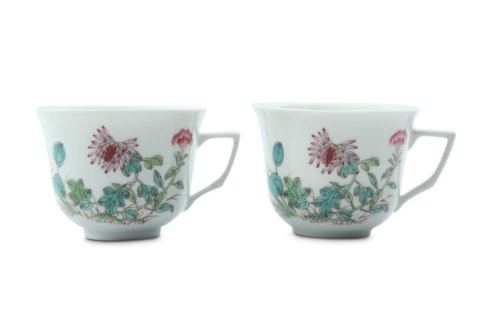 Lot 16 - A PAIR OF CHINESE FAMILLE ROSE COFFEE CUPS.