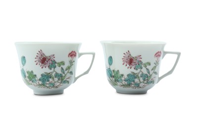 Lot 476 - A PAIR OF CHINESE FAMILLE ROSE COFFEE CUPS.