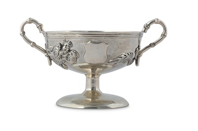 Lot 570 - A CHINESE SILVER 'DRAGON' HANDLED GOBLET.