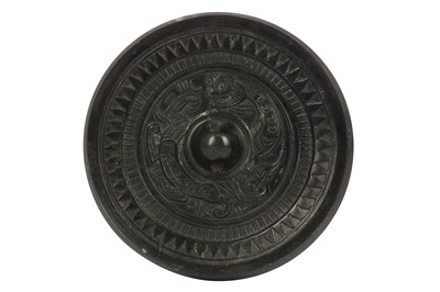 Lot 273 - A CHINESE BRONZE MIRROR.