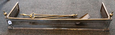 Lot 518 - A brass fire fender sold together with a set...