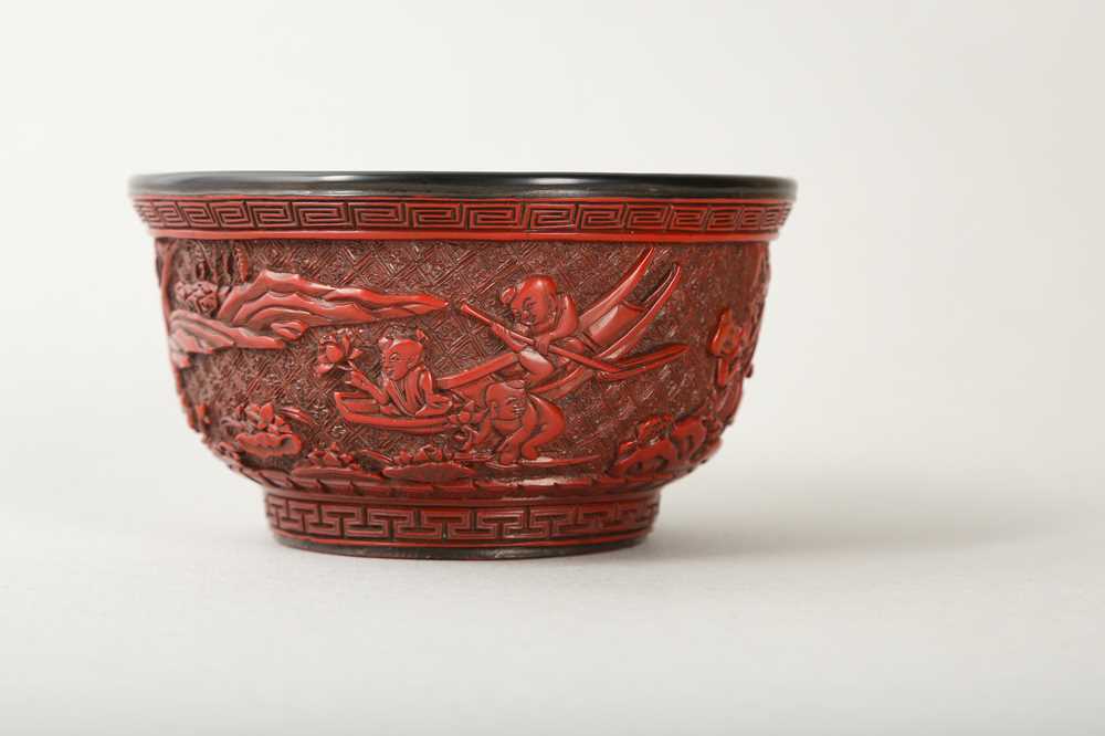 Lot 39 - A CHINESE CARVED CINNABAR LACQUER 'BOYS' BOWL.