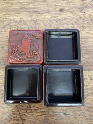 Lot 37 - A CHINESE CINNABAR LACQUER THREE-TIERED BOX AND COVER.