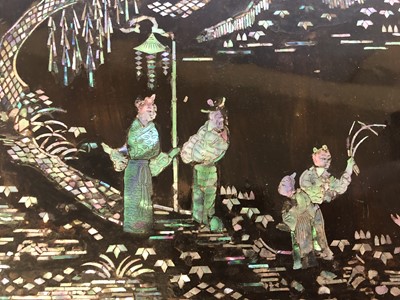 Lot 324 - A CHINESE MOTHER OF PEARL-INLAID LACQUER BOX AND COVER.