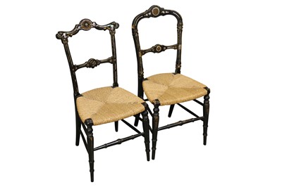 Lot 456 - A near pair of late Victorian ebonised and mother of pearl inlaid side chairs