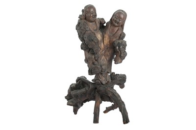 Lot 676 - A CHINESE ROOTWOOD 'HEHE ERXIAN' CARVING.