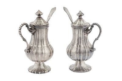 Lot 65 - A pair of late 19th century Dutch silver mustard pots with spoons, Groningen or Schoonhoven circa 1890