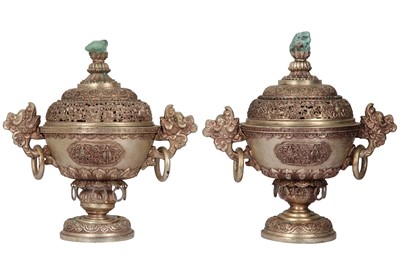 Lot 987 - A PAIR OF TIBETAN WHITE METAL INCENSE BURNERS AND COVERS.