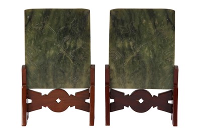 Lot 30 - A PAIR OF CHINESE GREEN JADE 'LADY AND BOY ' TABLE SCREENS.