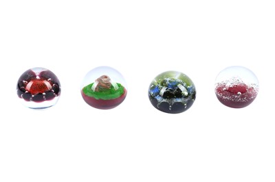 Lot 324 - A set of four limited edition Caithness paperweights