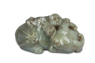 Lot 416 - A CHINESE PALE CELADON JADE 'BOY AND BUFFALO CARVING.