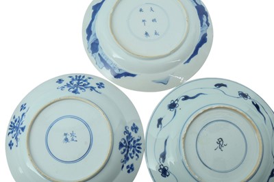 Lot 412 - THREE CHINESE BLUE AND WHITE DISHES.
