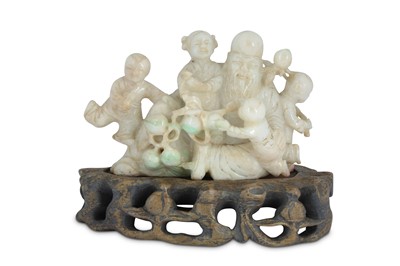 Lot 196 - A CHINESE JADEITE CARVING OF SHOU LAO AND FOUR CHILDREN.