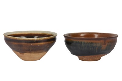 Lot 485 - A CHINESE JIAN BOWL AND A WHITE-RIMMED TEABOWL.