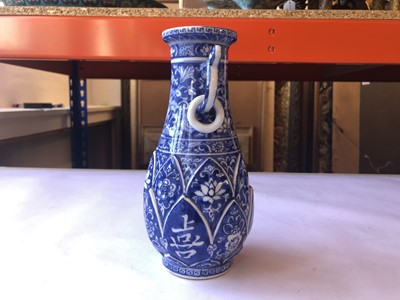 Lot 257 - A CHINESE BLUE AND WHITE LOOP-HANDLED 'LONGEVITY' VASE.