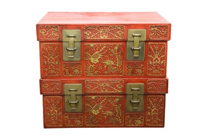 Lot 165 - A PAIR OF CHINESE LEATHER CINNABAR LACQUER AND GILT-DECORATED CHESTS.