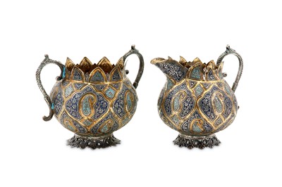 Lot 125 - An early 20th century Anglo – Indian Raj unmarked silver parcel gilt and enamel milk jug and twin handled sugar bowl, Kashmir, Srinagar circa 1900-20