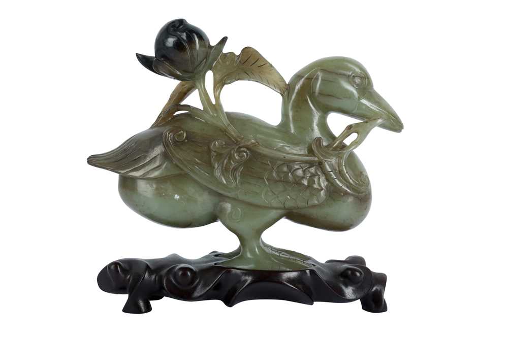 Lot 429 - A CHINESE CELADON JADE 'DUCK' CARVING.