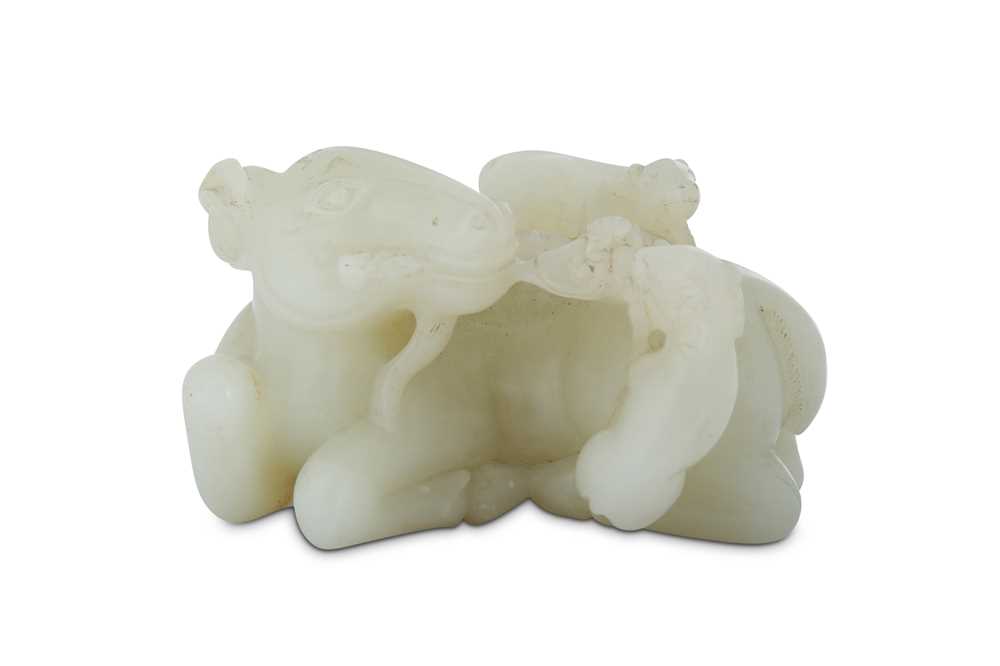 Lot 422 - A CHINESE WHITE JADE 'RAM' CARVING.