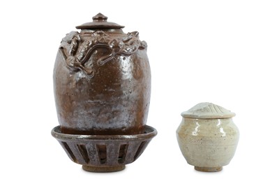 Lot 808 - TWO CHINESE GLAZED POTTERY JARS, COVERS AND STAND.