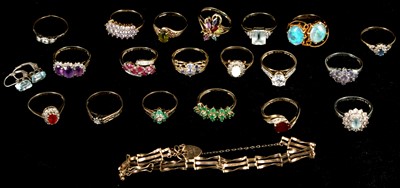 Lot 87 - A collection of 19 yellow gold and gem set...