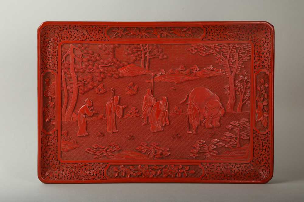 Lot 40 - A CINNABAR LACQUERED ‘ELEPHANT’ TRAY.