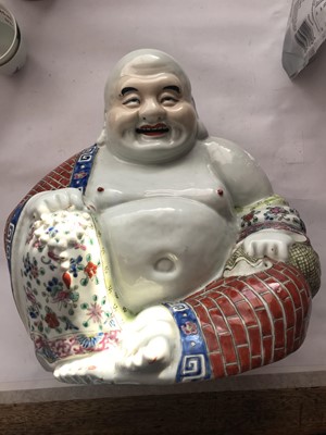 Lot 61 - A CHINESE FAMILLE ROSE FIGURE OF BUDAI HESHANG.