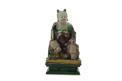 Lot 229 - A CHINESE FAMILLE VERTE SANCAI FIGURE OF AN IMMORTAL.