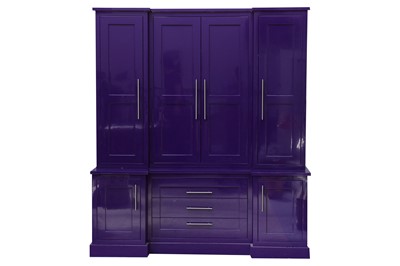 Lot 120 - A contemporary bespoke free standing cupboard or wall unit finished in a high gloss purple