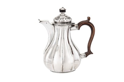 Lot 64 - A German silver bachelor coffee pot (verseuse égoiste), bearing marks probably Uberlingen circa 1780 by MFL with a device (untraced)