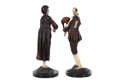 Lot 48 - MANNER OF SIMON TROGER: A PAIR OF 18TH CENTURY FRUITWOOD AND IVORY FIGURES