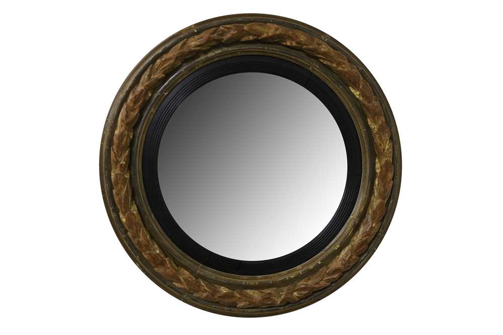 Lot 416 - A Regency convex wall mirror
