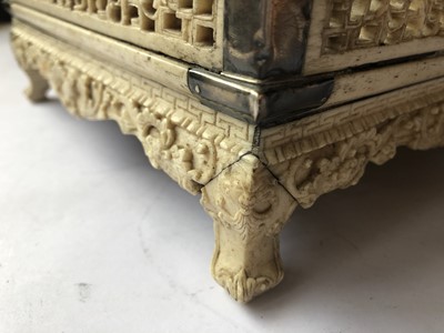 Lot 552 - A CHINESE SQUARE-SECTION RETICULATED BONE STAND.