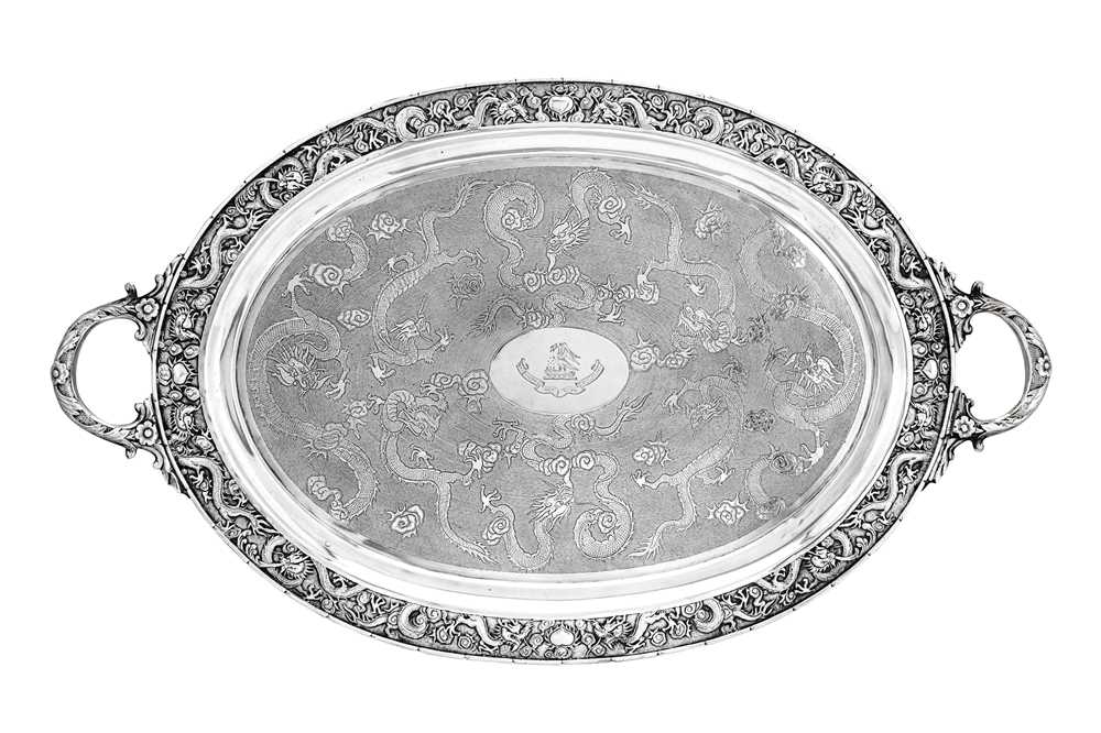 Lot 172 - A large late 19th / early 20th century Chinese Export silver twin handled tray, Canton circa 1900, retailed by Wang Hing